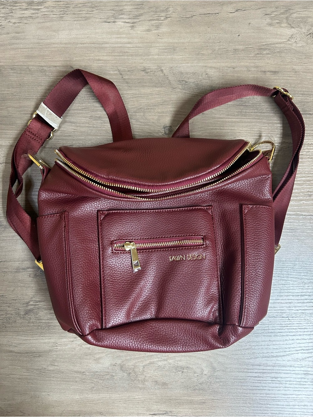 Fawn Design Pebbled Crossbody Backpack in Burgundy